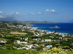 The town of Kefalos, the Aegean Sea, the island of Palaiokastro and Mount Dikeos, viewed from the tour bus