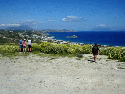 Miaomiao at the viewing point at the north side of the town of Kefalos, with a view on the town, the Aegean Sea, the island of Palaiokastro and Mount Dikeos