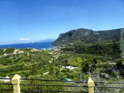 The southwest end of the island, the town of Kamari, the Aegean Sea and the island of Giali, viewed from the tour bus at the town of Kefalos