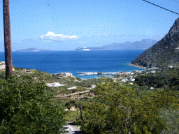 The town of Kamari, the Aegean Sea and the islands of Giali and Nisiros, viewed from the tour bus on the Eparchiakis Odou Ko-Kefalou street at the town of Kefalos
