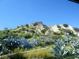 Ruins of the Kefalos Castle, viewed from the tour bus on the Eparchiakis Odou Ko-Kefalou street