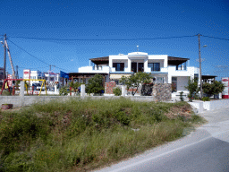 Building near the Kos International Airport Hippocrates, viewed from the tour bus on the Eparchiakis Odou Ko-Kefalou street