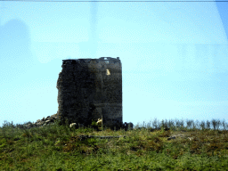Ruins of a tower near the town of Irakleides, viewed from the tour bus on the Eparchiakis Odou Ko-Kefalou street