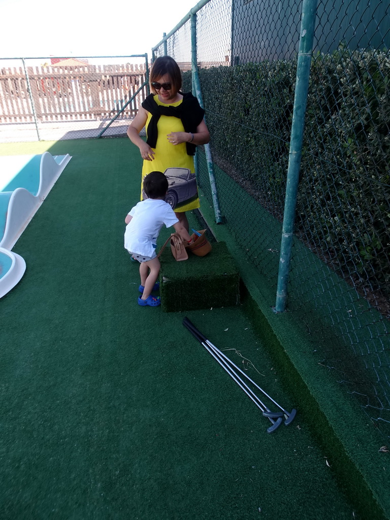 Miaomiao and Max playing minigolf at the Minigolf Court at the Blue Lagoon Resort