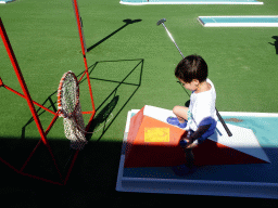 Max playing minigolf at the Minigolf Court at the Blue Lagoon Resort
