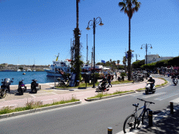 The Akti Kountouriotou street and boats at the south side of the Limenas Ko harbour