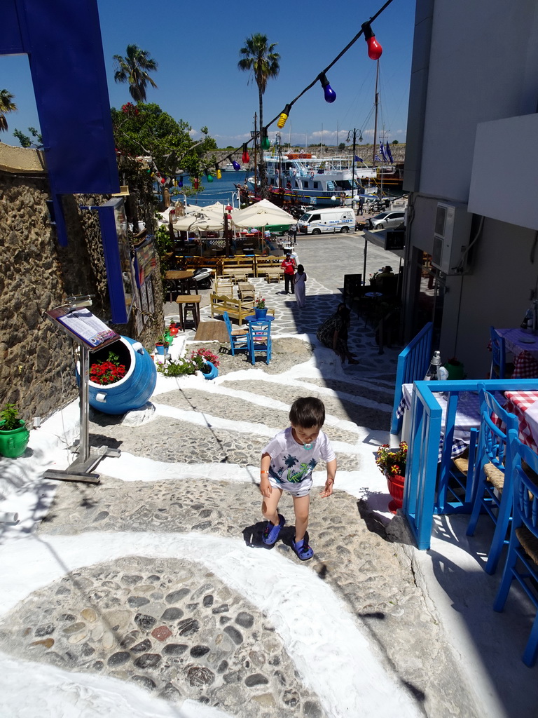 Max at the White Stairs of Kos at the Riga Fereou square