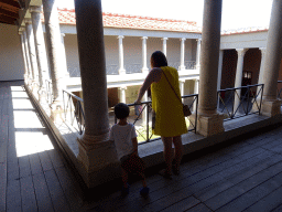 Miaomiao and Max at the Upper Floor of the Large Peristyle at the Casa Romana museum