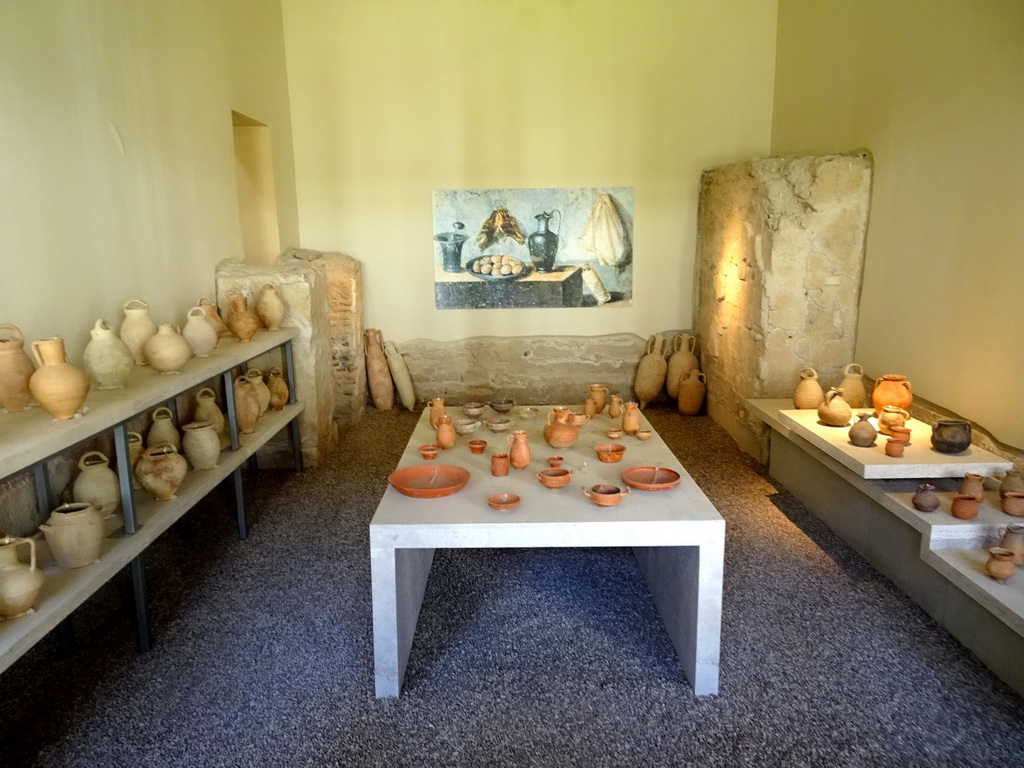 Vases, bowls, plates and amphoras at the Kitchen at the Casa Romana museum