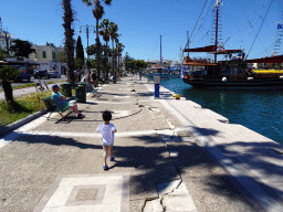 Max on the pavement damaged by the 2017 earthquake at the Akti Kountouriotou street