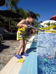 Max playing with a fishing pole at the Children`s Pool at the Blue Lagoon Resort