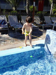 Max playing with a fishing pole at the Children`s Pool at the Blue Lagoon Resort