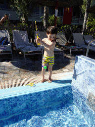 Max playing with a fishing pole at the Children`s Pool at the Blue Lagoon Resort