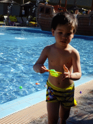 Max playing with animal toys at the Children`s Pool at the Blue Lagoon Resort