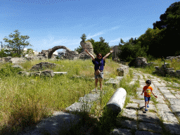 Miaomiao and Max with the Ancient Gymnasium at the West Archaeological Site