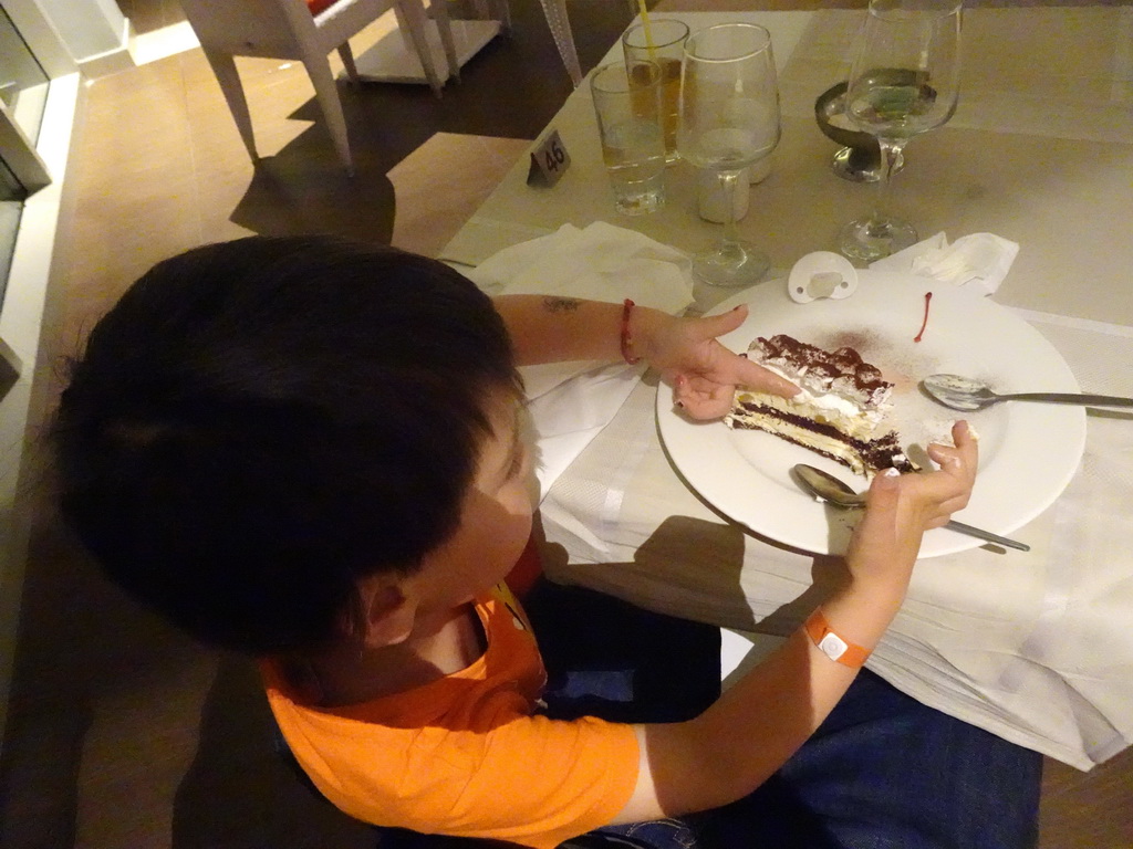 Max having dessert at the Karavi Restaurant at the Blue Lagoon Resort