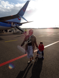 Miaomiao and Max in front of our airplane at Eindhoven Airport