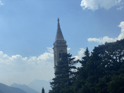 The tower of the Church of Saint Eustahije at the town of Dobrota, viewed from the tour bus on the E65 road