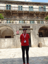 Our tour guide in front of the Pima Palace at the Flour Square