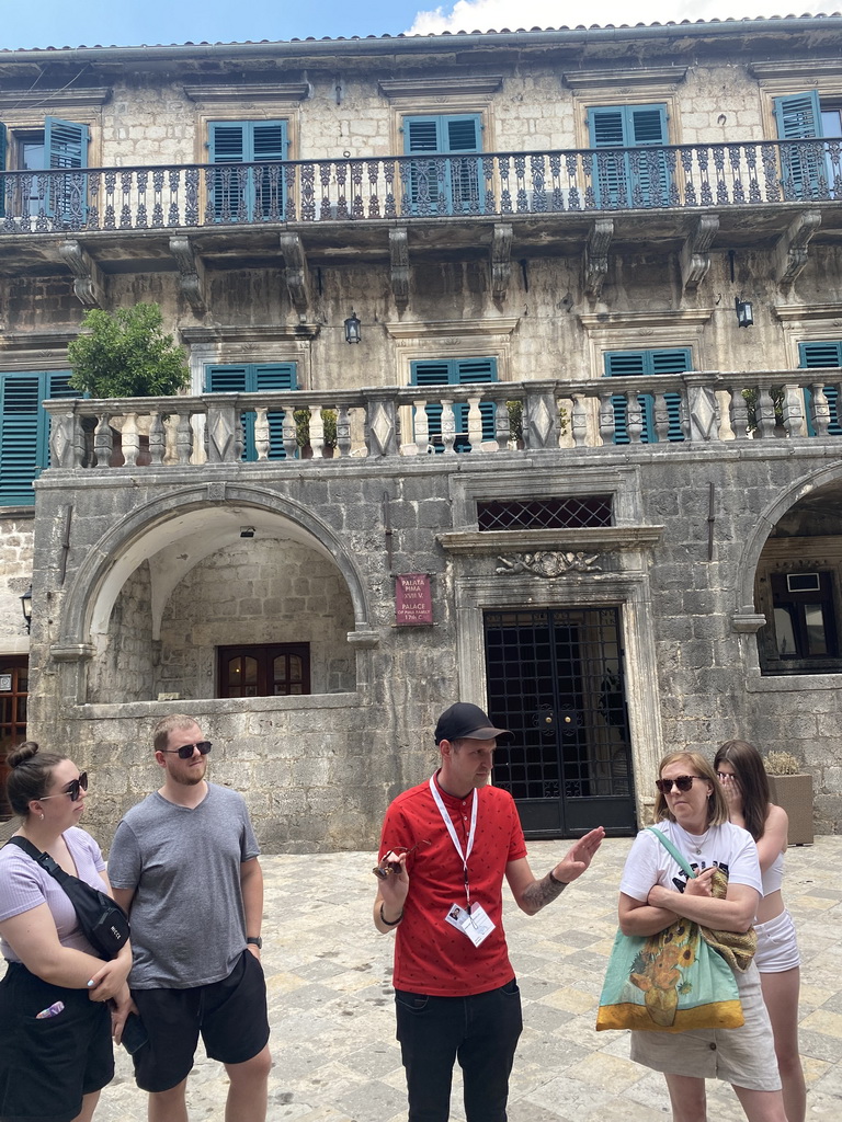 Our tour guide in front of the Pima Palace at the Flour Square