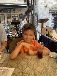 Max with a cola at the terrace of the Regina Del Gusto restaurant