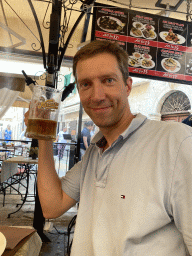 Tim with a Nikicko beer at the terrace of the Regina Del Gusto restaurant