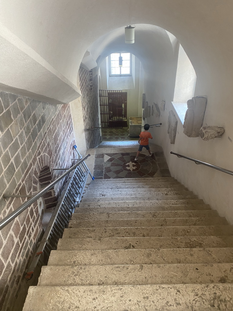 Max at the staircase at the museum from the upper floor to the lower floor of St. Tripun`s Cathedral