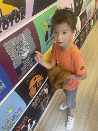 Max with a cat shirt print at a shop at the southeast side of the Cat Park