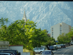 The tower of the Church of Saint Eustahije at the town of Dobrota, viewed from the tour bus on the E65 road