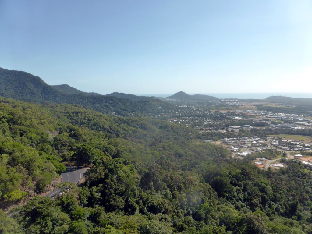 The town of Smithfield and the Kennedy Highway through the tropical rainforest west of Smithfield, viewed from the Skyrail Rainforest Cableway gondola