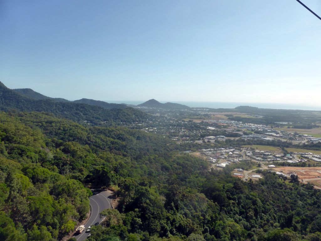 The town of Smithfield and the Kennedy Highway through the tropical rainforest west of Smithfield, viewed from the Skyrail Rainforest Cableway gondola