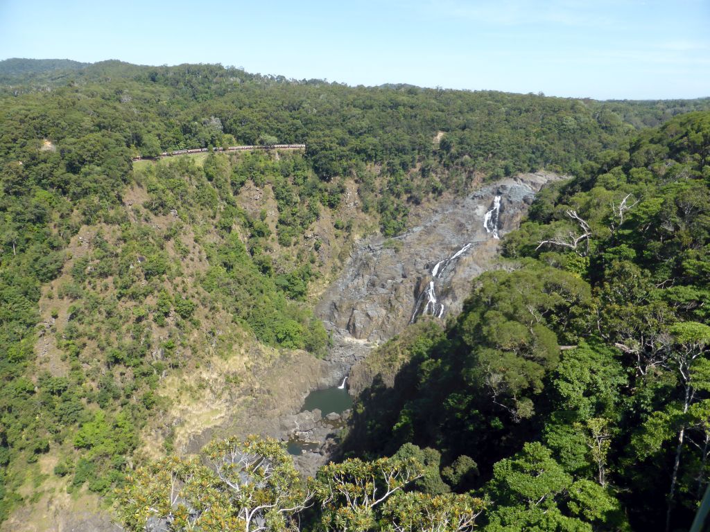 The Kuranda Scenic Railway train at the Barron Falls Railway Station and Barron Falls, viewed from the Skyrail Rainforest Cableway gondola