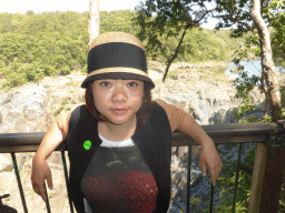 Miaomiao at the third viewpoint at the Barron Falls Skyrail Station, with a view on the Lake at the top of the Barron Falls