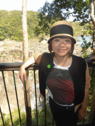 Miaomiao at the third viewpoint at the Barron Falls Skyrail Station, with a view on the Lake at the top of the Barron Falls