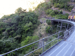 The Kuranda Scenic Railway train at the Stoney Creek Falls Bridge