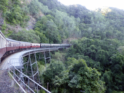 The Kuranda Scenic Railway train at the Stoney Creek Falls Bridge