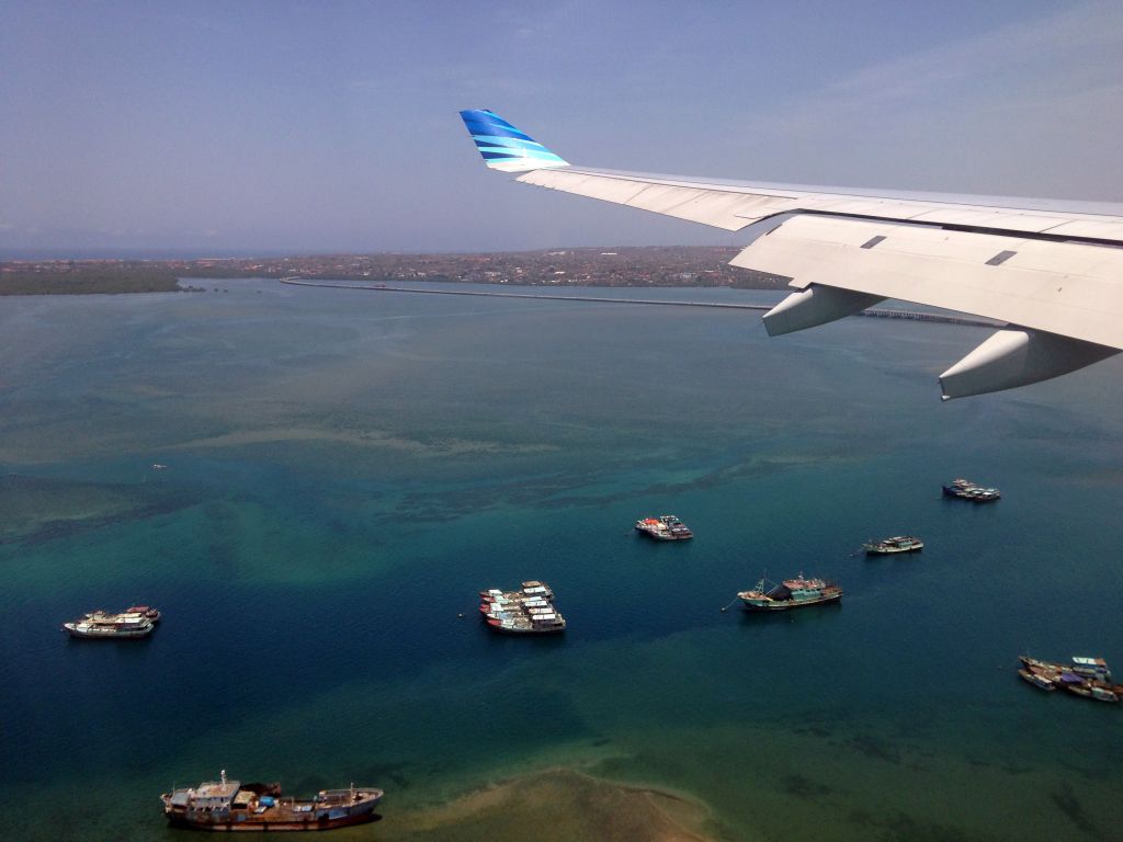 The Kuta Selatan peninsula and the Mandara Toll Road over the Gulf of Benoa, viewed from the airplane from Melbourne