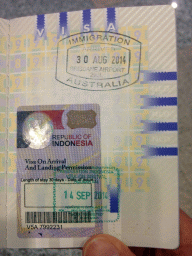 Visa-on-arrival for Indonesia in my passport, at the Ngurah Rai International Airport