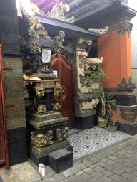 Shrine in front of a house in a small street at the south side of town