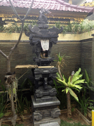 Shrine in front of a house in a small street at the south side of town