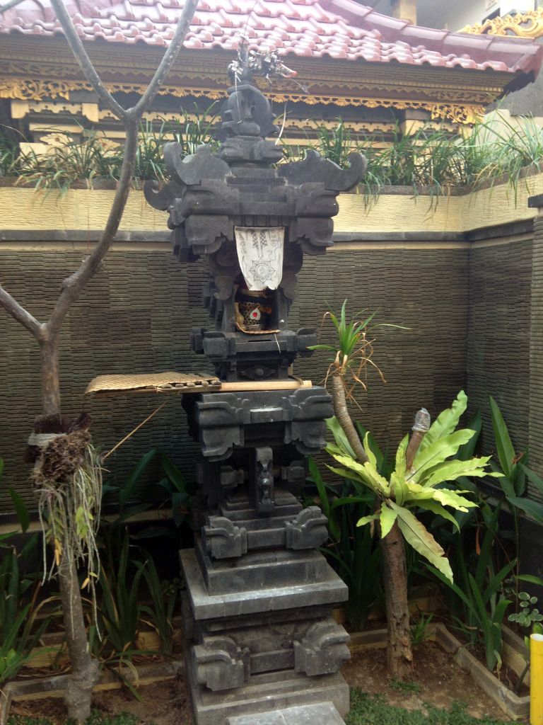 Shrine in front of a house in a small street at the south side of town