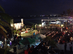 Show at a stage at the back side of the Discovery Shopping Mall at the Pantai Kuta beach, by night