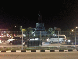 Back side of the statue of I Gusti Ngurah Rai at the northeast side of the Ngurah Rai International Airport, by night