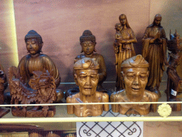 Wooden statuettes in a shop at the departures hall at the SoekarnoHatta International Airport of Jakarta