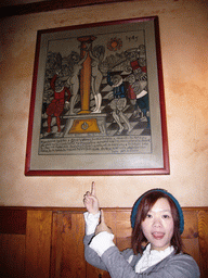 Miaomiao with a painting in our lunch restaurant `Dacický`