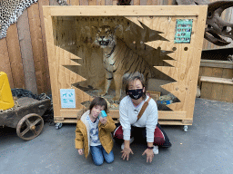 Miaomiao and Max with a stuffed Tiger at the Dino Expo at the Berkenhof Tropical Zoo