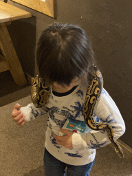 Max with a snake at the Nature Classroom at the Berkenhof Tropical Zoo