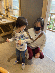 Miaomiao and Max with a snake at the Nature Classroom at the Berkenhof Tropical Zoo