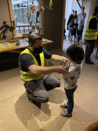 Max and a zookeeper with a Blue-tongued Skink at the Nature Classroom at the Berkenhof Tropical Zoo