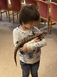 Max with a Blue-tongued Skink at the Nature Classroom at the Berkenhof Tropical Zoo